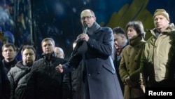 Arseniy Yatsenyuk addresses antigovernment protesters during a rally in Kyiv on February 18.