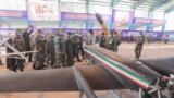 Top Iranian military commanders inspect domestically manufactured military drones unveiled at an exhibition in Semnan in January 2021. 