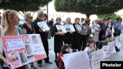 Armenia - Parents of dead soldiers and civic activists demonstrate outside the government building in Yerevan, 15Sep2011.