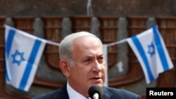 Israeli Prime Minister Benjamin Netanyahu speaks during the commemoration of victims and award ceremony of the Righteous Among the Nations at the Paneriai Memorial in Vilnius, Lithuania August 24, 2018. REUTERS/Ints Kalnins 