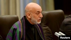 Afghan President Hamid Karzai is constitutionally barred from seeking a third term. 