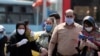 Iranians wearing face masks go shopping around Tehran's grand bazaar in Tehran, Iran, 07 July 2020. 