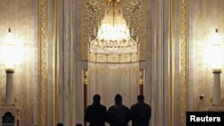 Russia - Worshippers pray during a morning mass in the central mosque in Gronzy, 10Mar2011