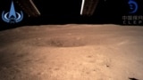 Prva fotografija tamne strane Mjeseca koju je snimila kineska lunarna sonda Chang'e-4 nakon sletanja na Mjesec, 3. januara 2019.