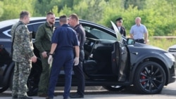 A car and employees of security services are seen at the scene where the body of former Russian Transport Minister Roman Starovoit was found. According to the Russian Investigative Committee, the body of Roman Starovoit with a gunshot wound was found in his car, the main version is suicide.
