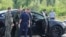 A car and employees of security services are seen at the scene where the body of former Russian Transport Minister Roman Starovoit was found. According to the Russian Investigative Committee, the body of Roman Starovoit with a gunshot wound was found in his car, the main version is suicide.