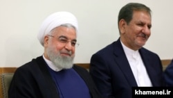 Eshagh Jahangiri (right) with outgoing Iranian President Hassan Rouhani. (file photo)