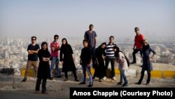 A group of young Iranians in the hills above Tehran, trying to have fun together away from the prying eyes of the morality police. File photo