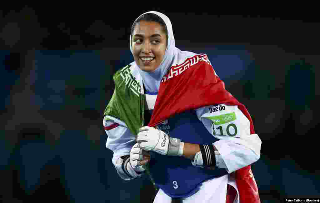 Kimia Alizadeh Zenoorin&nbsp;of Iran celebrates after becoming the first Iranian woman to win a medal in an Olympic event. Alizadeh defeated Sweden&rsquo;s&nbsp;Nikita Glasnovic​&nbsp;to win bronze in the women&#39;s 57-kilogram taekwondo.&nbsp; 