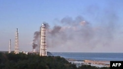 Black smoke rises from reactor no. 3 of the Fukushima nuclear power plant.