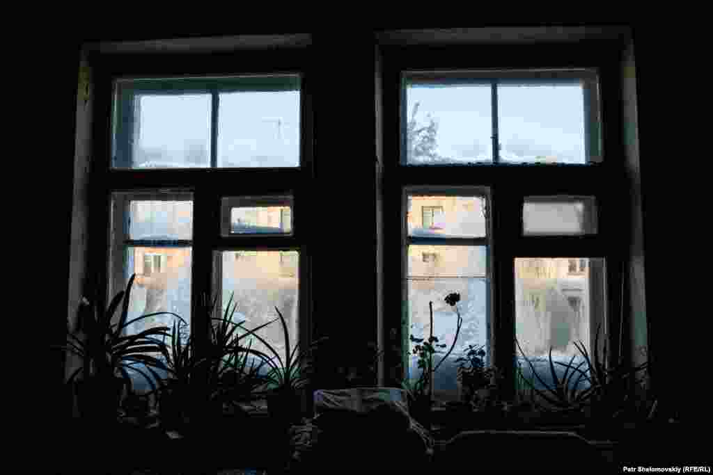 Icy windows in Olga's apartment