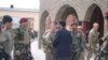 General Austin Miller (center), U.S. Army commander in Afghanistan, meets with the governor of Ghazni Province on November 21.