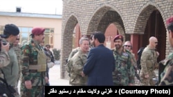 General Austin Miller (center), U.S. Army commander in Afghanistan, meets with the governor of Ghazni Province on November 21.