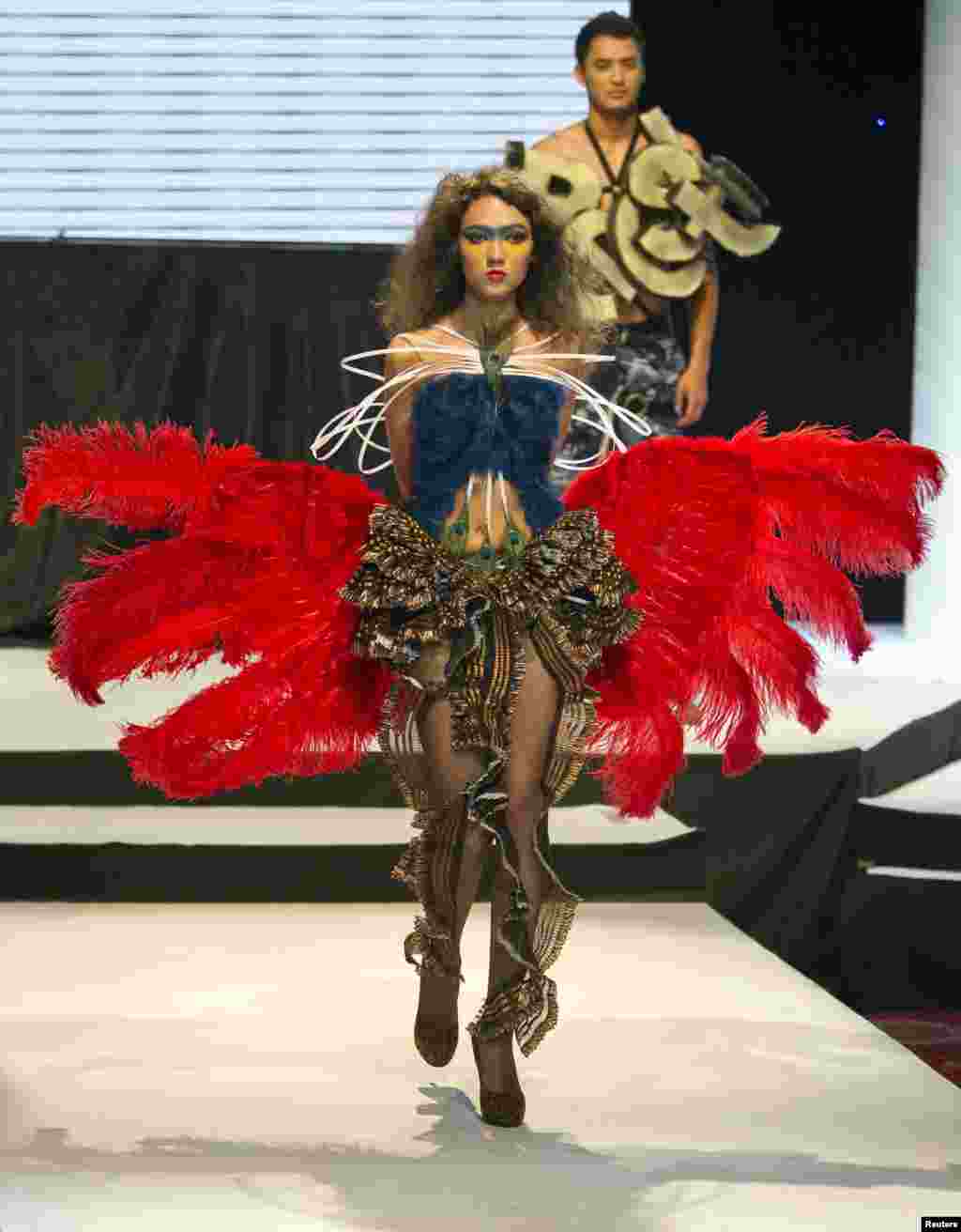 Erkhat Maksutov spread his creative wings with this eyecatching outfit.