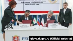 Подписание соглашения о сотрудничестве между Ингушетией и Крымом на инвестфоруме в Сочи, 15 февраля 2018 года