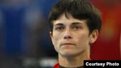 41-летняя чемпионка мира по спортивной гимнастике Оксана Чусовитина. 