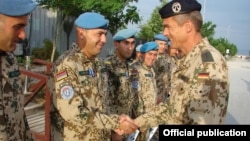 Afghanistan - A German army general gives medals to Armenian soldiers serving in Afghanistan.