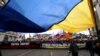 Tens of thousands of people are estimated to have turned out for a "peace march" in support of Ukraine in Moscow on March 15. 