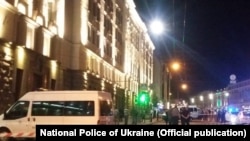 Investigators at the scene of the shooting incident in Kharkiv on August 20.