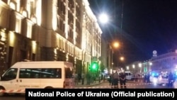 Investigators at the scene of the shooting incident in Kharkiv on August 20.