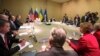 Participants from Russia, Ukraine, the EU, and the United States thrash out a deal aimed at resolving the Ukrainian crisis in Geneva on April 17.