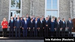 EU leaders posing for a "family photo" at a summit in Tallinn, Estonia, on September 29.