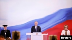 Vladimir Putin (center) is sworn as Russian president during a ceremony at the Kremlin in Moscow on May 7.