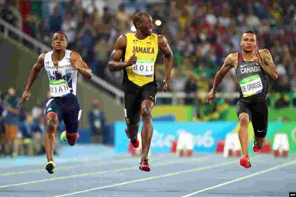 (Left to right;) Chijindu Ujah of Britain, Usain Bolt of Jamaica, and Andre de Grasse of Canada compete during the men&#39;s 100-meter semifinals at the Summer Olympics in Rio de Janeiro. (epa/Srdjan Suki)&nbsp;