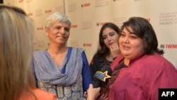 Azerbaijan -- investigative journalist Khadija Ismayilova, right (Credit Charley Gallay/Getty Images)