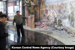 North Korean leader Kim Jong Un viewing a diorama depicting North Korean troops fighting in Russia’s Kursk region inside the Pyongyang memorial during its construction in early April.