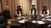 The strike came just hours after US special representative Zalmay Khalilzad (left) and senior Taliban officials spoke by phone with U.S. President Donald Trump on March 4.