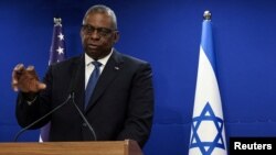 U.S. Secretary of Defense Austin and Israeli Defense Minister Gallant hold a joint press conference at Israel's Ministry of Defense, in Tel Aviv