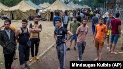 Босқындар лагеріндегі мигранттар. Вильнюс, 4 тамыз 2021 жыл. 