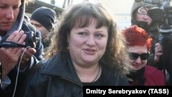 Oksana Sevastidi, a shopkeeper from the Black Sea resort city of Sochi, is released from prison after being pardoned by Russian President on March 12. 