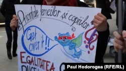 Demonstrators protest against gender discrimination in Chisinau on March 8.