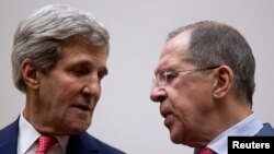 John Kerry și omologul său rus, Sergei Lavrov, la 24 noiembrie, la Geneva