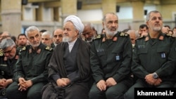 Iran Supreme Leader's representative to the IRGC, Ali Saeedi (2nd L).