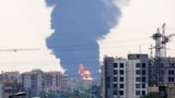 A plume of heavy smoke and fire rise from an oil refinery in southern Tehran, after it was hit in an overnight Israeli strike, on June 15, 2025. Could the Israel-Iran conflict affect Russia’s war against Ukraine?