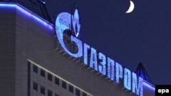 Russia -- The logo of gas company Gazprom illuminated on Gazprom headquarters in Moscow, 02Jan2009