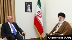 Iran's supreme leader, Ayatollah Ali Khamenei (R) meets with Iraqi Prime Minister Haider al-Abadi in Tehran, October 26, 2017