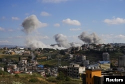 Plumes of smoke billow from southern Lebanon following Israeli strikes on May 25.