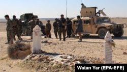 Afghan troops patrol in Helmand on March 3.