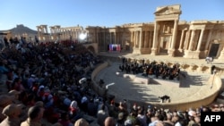 Russian conductor Valery Gergiev leads a concert in the amphitheatre of the ancient Syria city of Palmyra earlier this month, an event which was covered uncritically by a number of Western news outlets. 