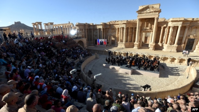Russian conductor Valery Gergiyev leads a concert in the amphitheater of the ancient city of Palmyra in May 2016.