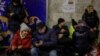 People take shelter inside a subway station during an air-raid alert in Kyiv on January 8.