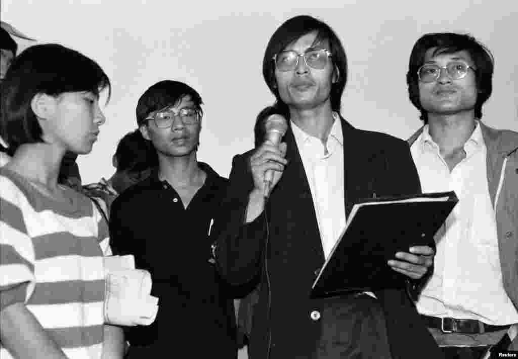 Chinese student leaders (from left to right) Chai Ling, Wang Dan, Feng Congde and Li Lu swear to remain in Beijing's Tiananmen Square throughout June, 1989.