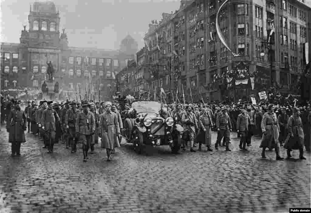 After weeks at sea, the legionnaires of Russia finally returned to their independent homeland under its new president, Tomas Garrigue Masaryk (visible inside car during his 1918 inauguration in Prague).