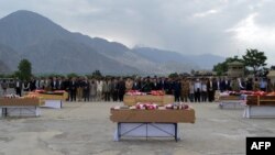 Pakistan -- Pakistani officials and foreign diplomats attend a funeral ceremony for the victims of a Pakistani army helicopter crashed in Gilgit on May 9, 2015.