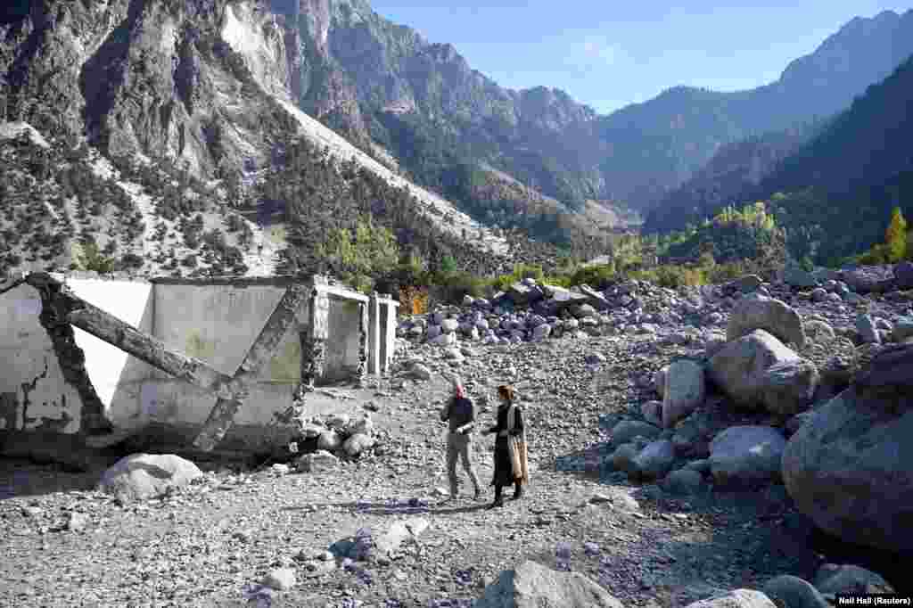 William and Kate in the foothills of the Himalayas while visiting flood victims in the Chitral District.