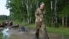 The Bogaty­rskaya Zastava (Heroes' Outpost) camp near the Siberian city of Omsk has operated for nearly two decades and says its goal is to "raise future warrior-defenders of the Motherland."